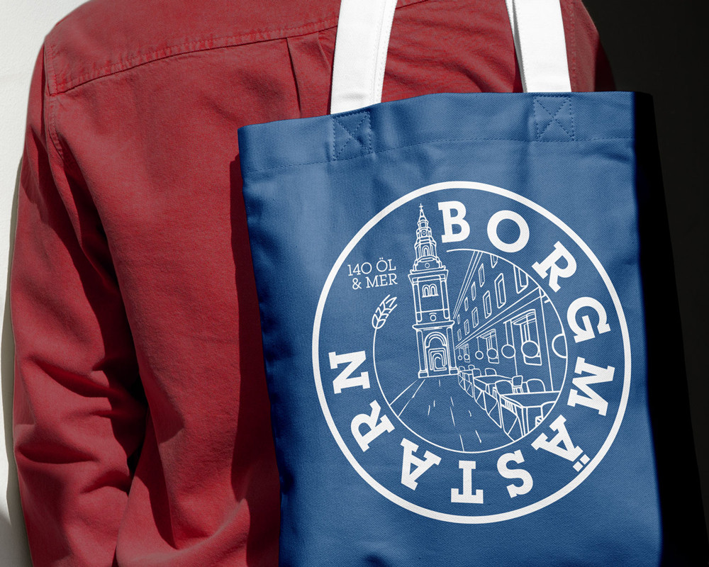 Tygkasse med pubens logotyp